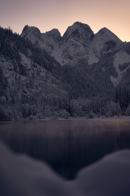 Tranquil twilight view of snow-covered mountains in Upper Austria.