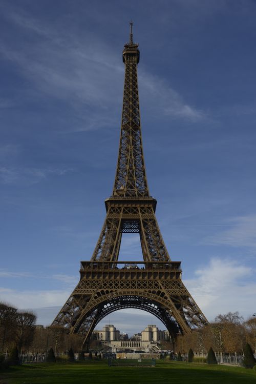 Free Stunning view of the Eiffel Tower in Paris against a clear blue sky. Stock Photo