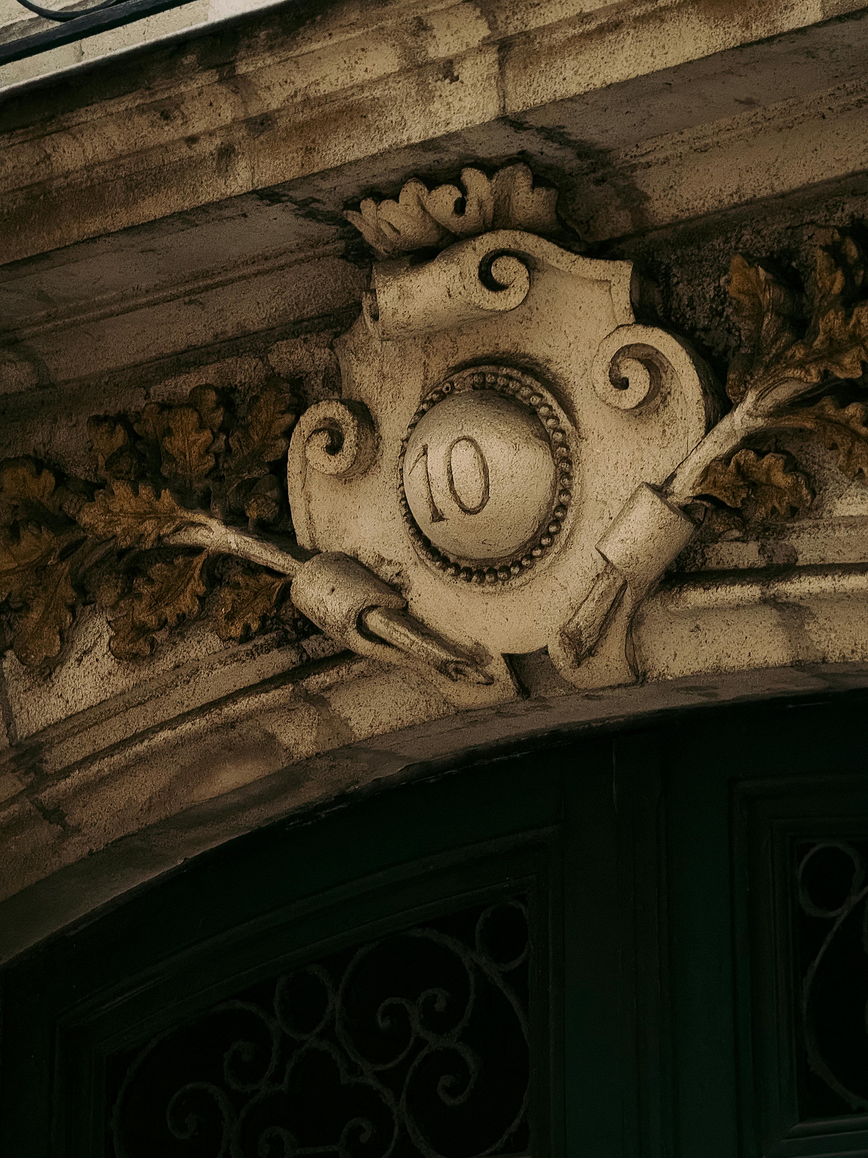 Free Close-up of ornate architectural detail showing the number 10 in Nantes, France. Stock Photo