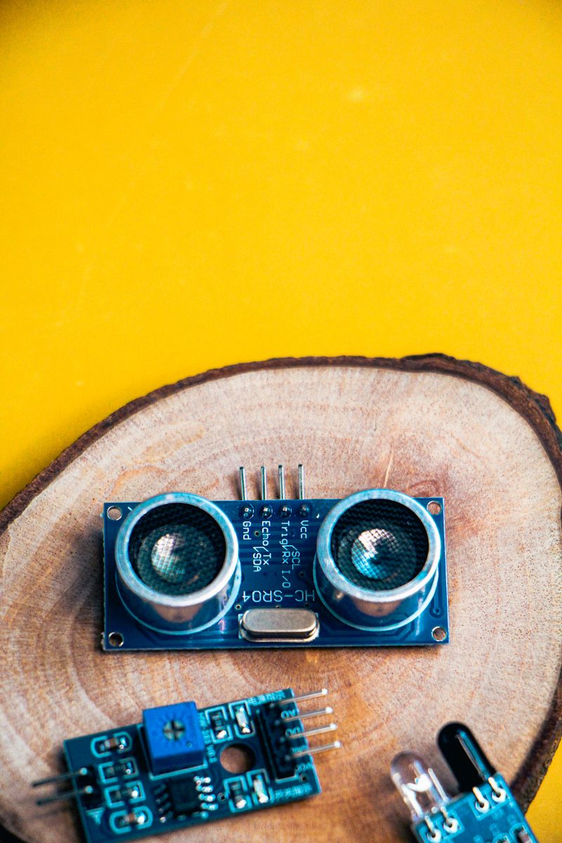 Arduino Microcontroller on Yellow Background · Free Stock Photo