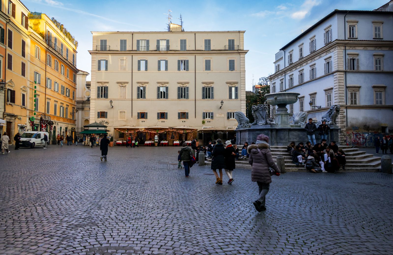 The cobblestone lanes of Trastevere are lined with trattorias that stay lively well into the evening.