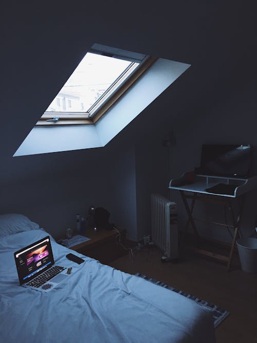 Free Black Laptop on Bed Stock Photo