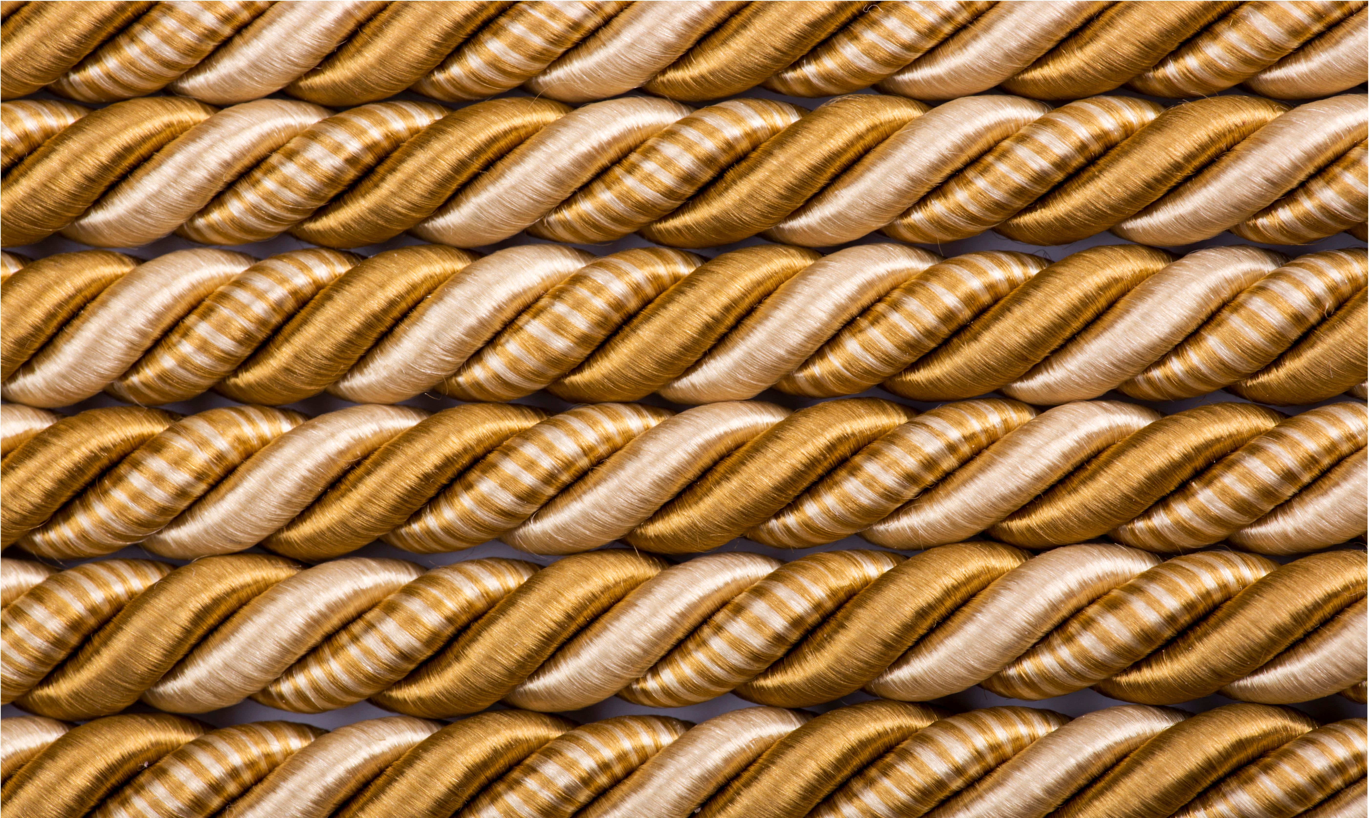 Close-Up of Gold and White Twisted Rope Texture · Free Stock Photo