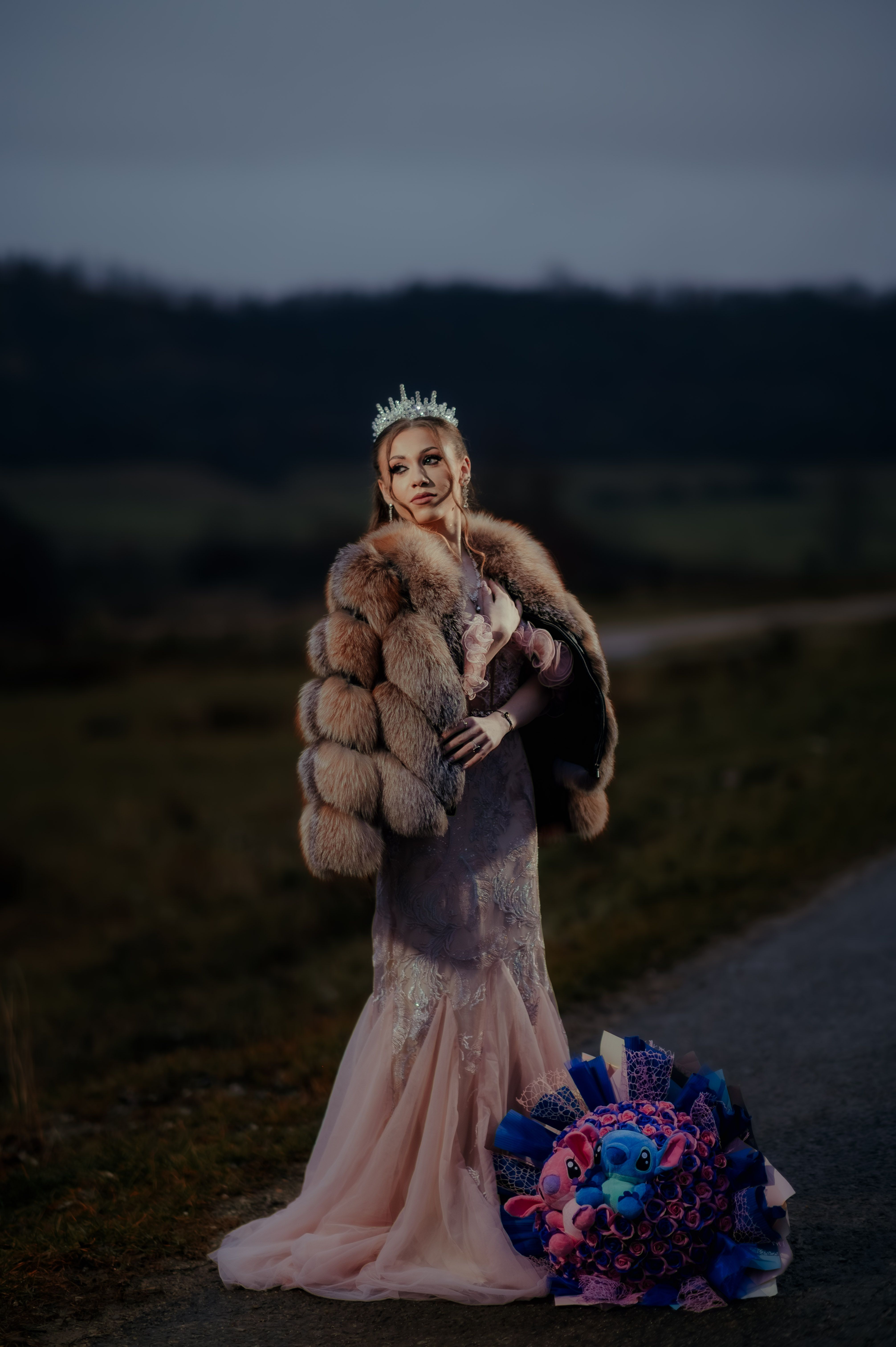 Elegant Portrait of a Woman in Evening Gown Outdoors · Free Stock Photo