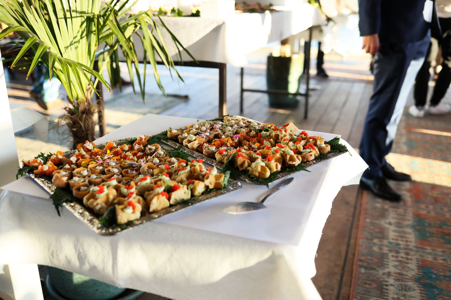 Party trays with burgers and fries for catering