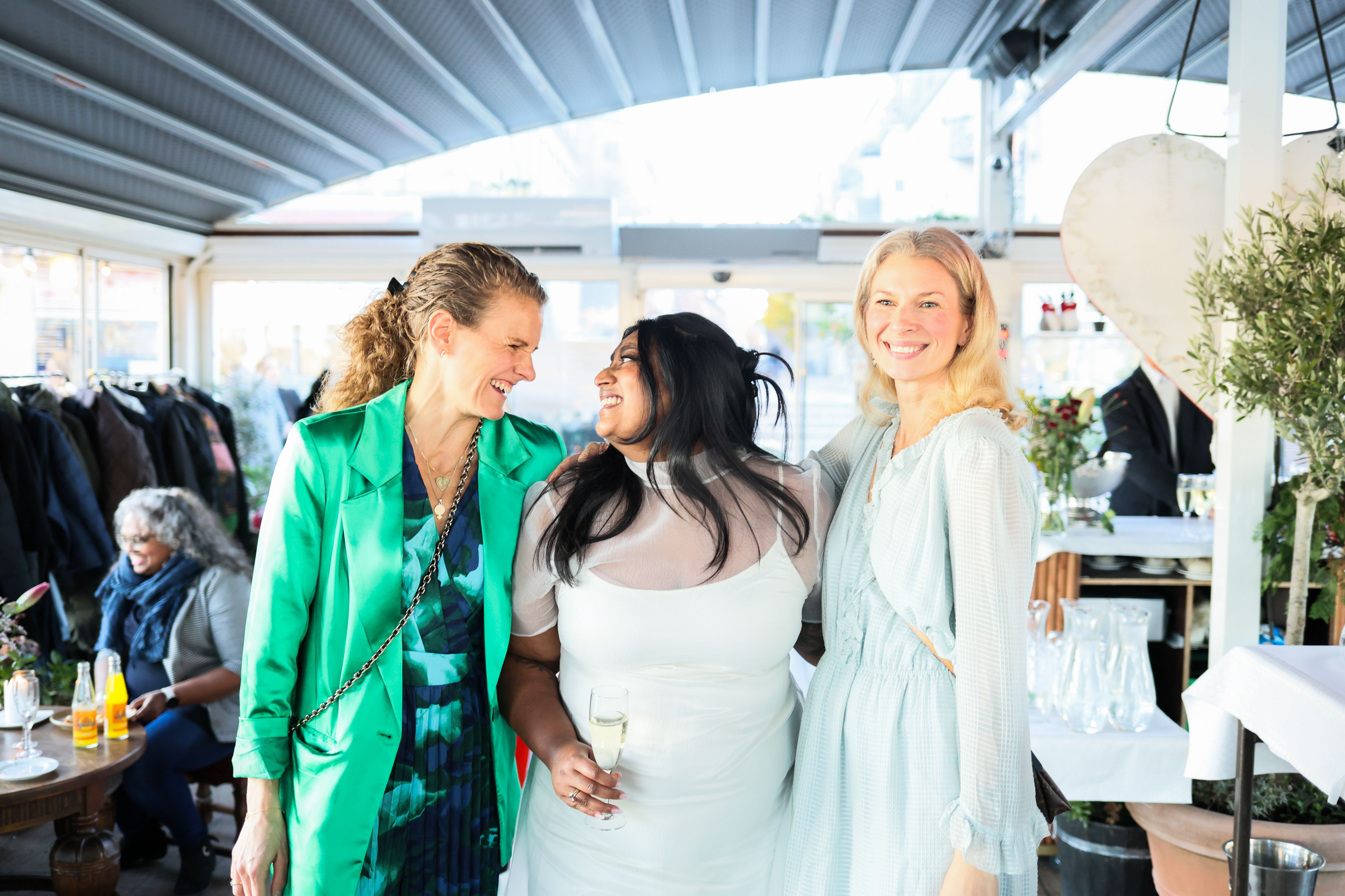 Cheerful Celebration Indoors at Day Event · Free Stock Photo