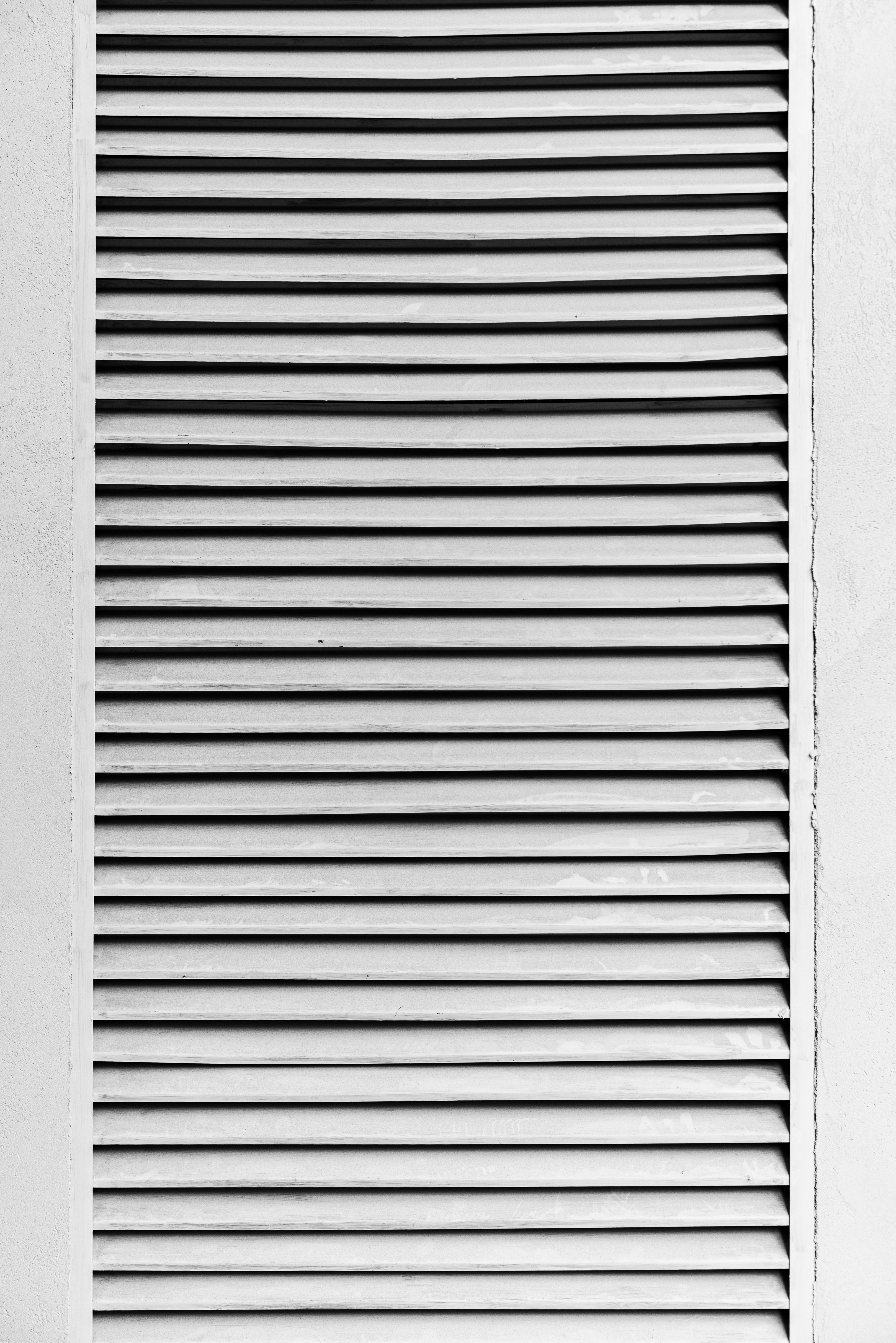 Monochrome Louvered Panel with High Contrast Lines · Free Stock Photo