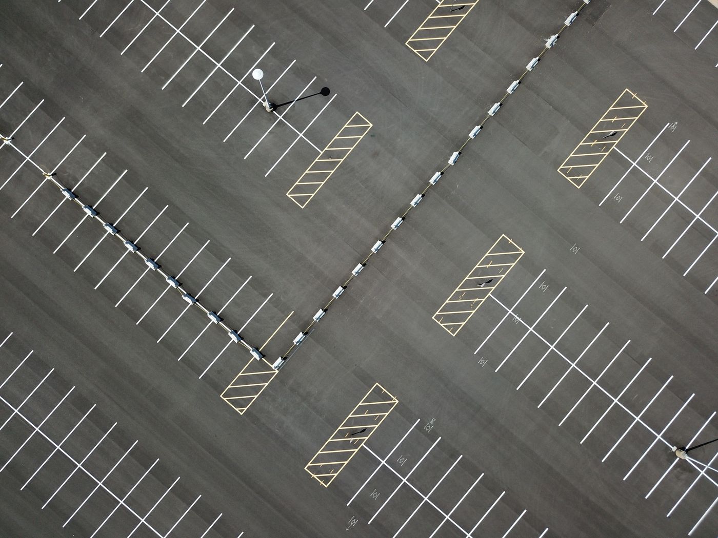Fresh white parking lot striping