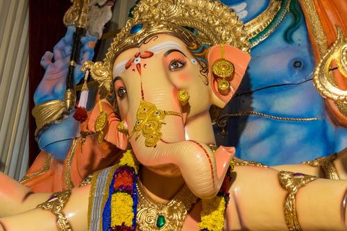 Free Colorful Lord Ganesha idol adorned for Ganesh Chaturthi festival in Mumbai, India. Stock Photo