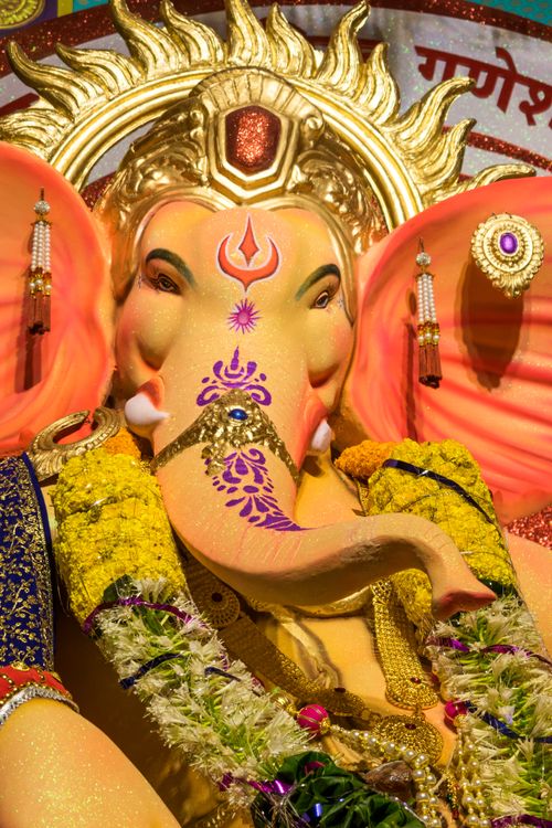 Free Close-up of vibrant Ganesh idol decorated for Ganesh Chaturthi festival in Mumbai, India. Stock Photo