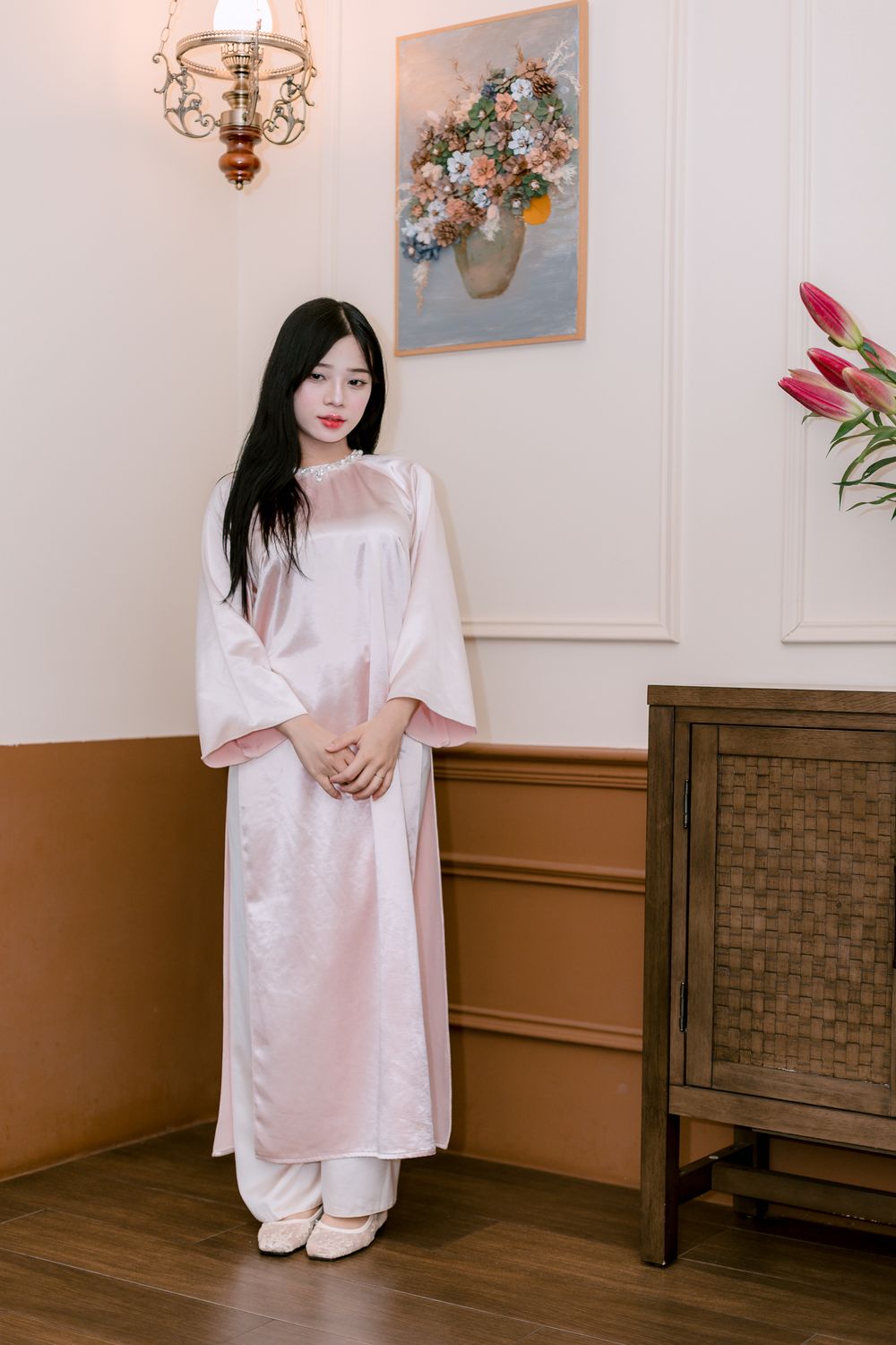Elegant Woman in Traditional Pink Silk Dress Indoors · Free Stock Photo