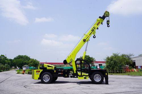 Free ACE F230 crane in Faridabad showing its boom lift against a clear sky. Stock Photo