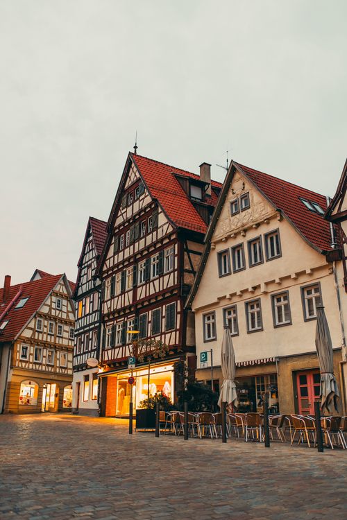 Free Picturesque historic street in Germany with classic half-timbered houses at twilight. Stock Photo