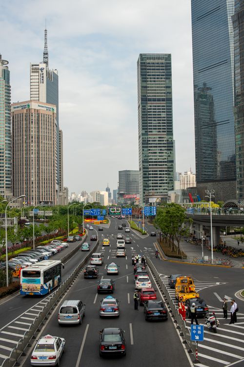 Free Dynamic view of Shanghai's bustling cityscape with high-rise buildings and busy streets. Stock Photo