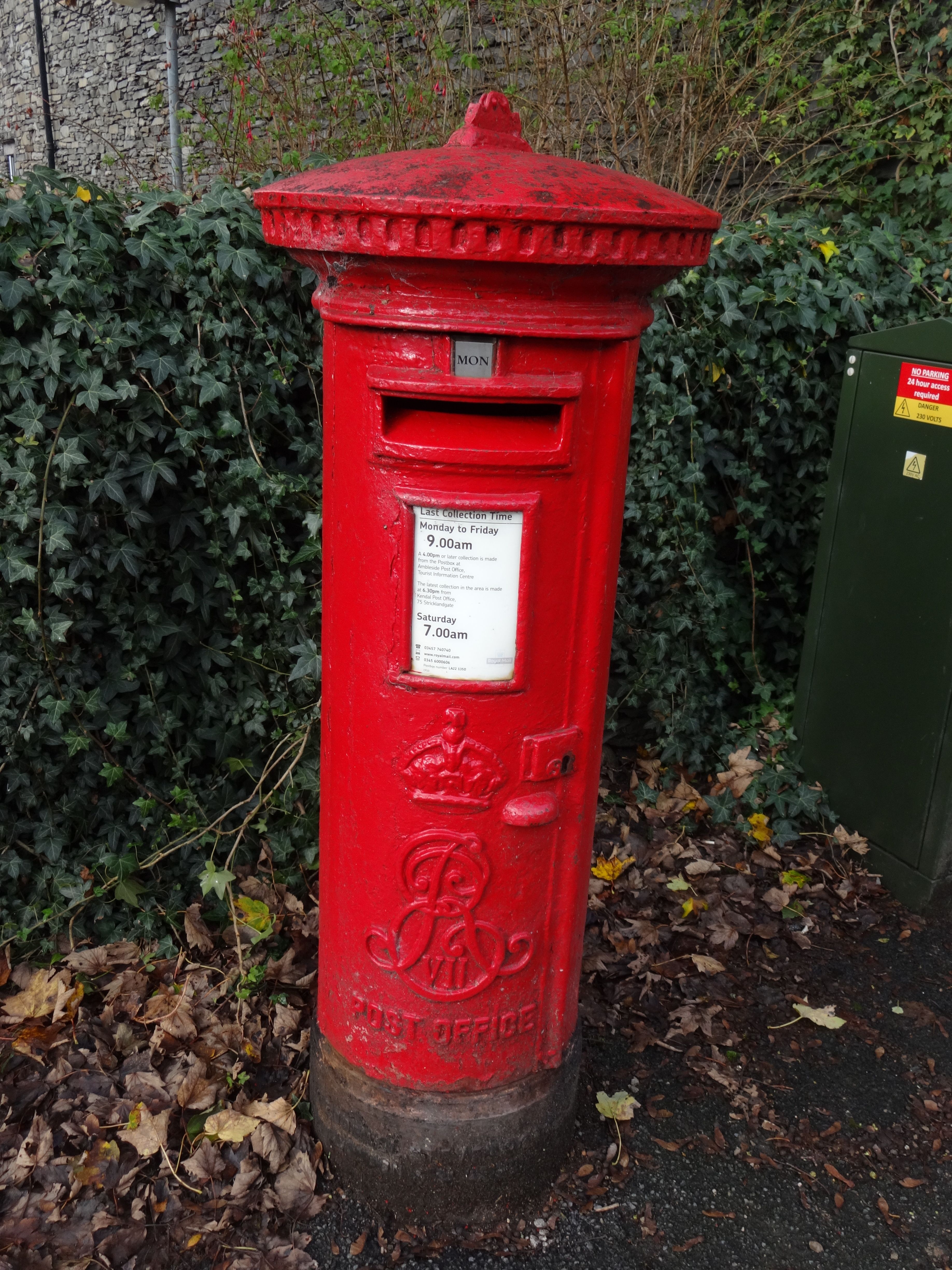 Red Post Box in England on Leafy Street · Free Stock Photo