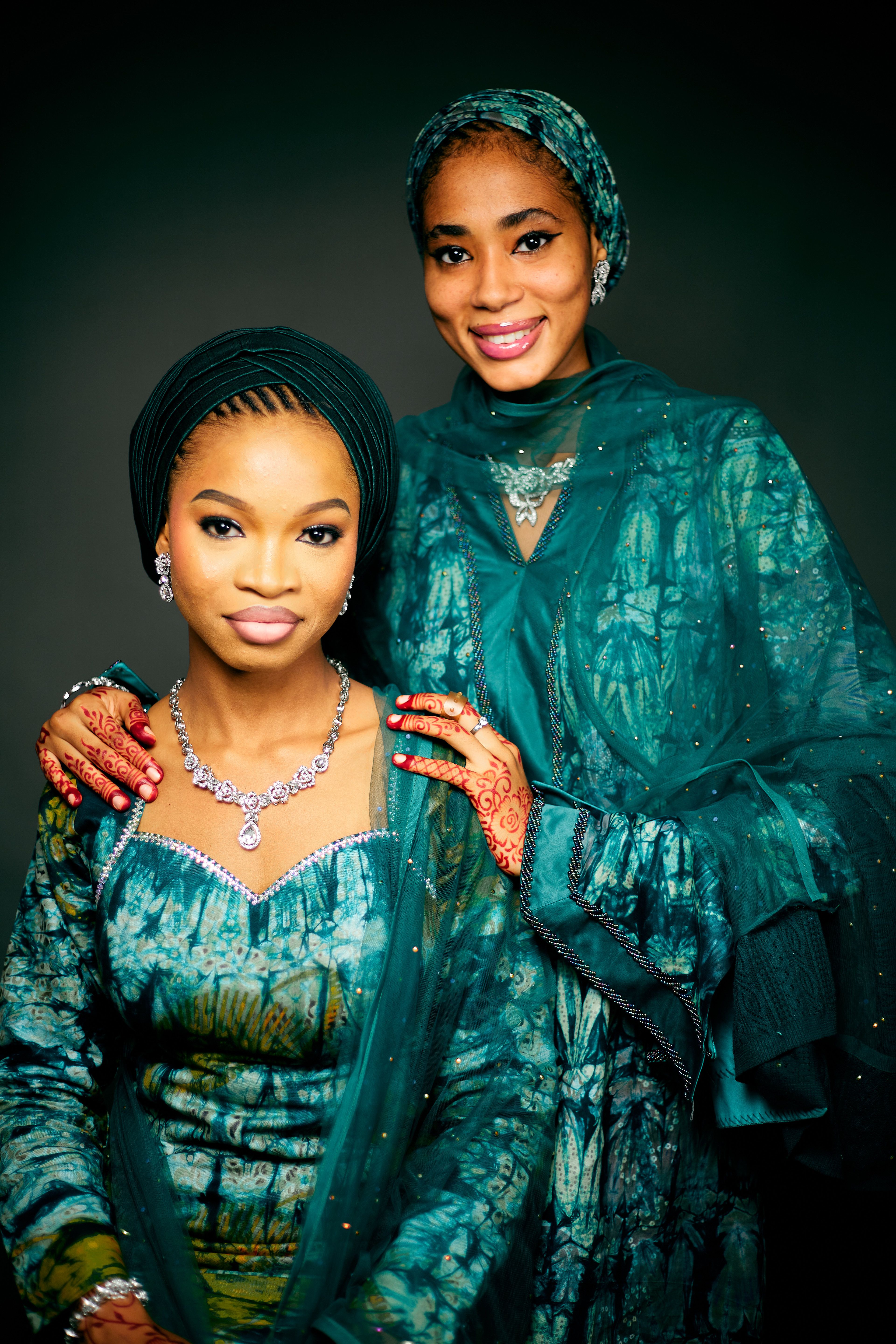 Elegant Portrait of Two Women in Traditional Attire · Free Stock Photo