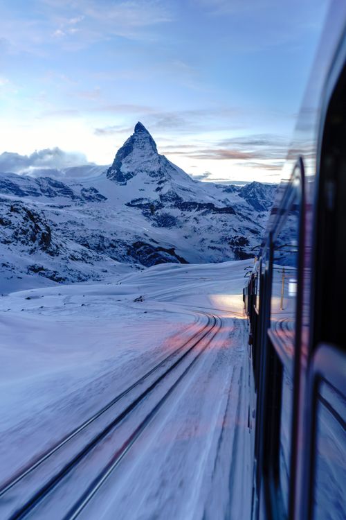 Scenic Train Ride Through Swiss Alps to Matterhorn · Free Stock Photo