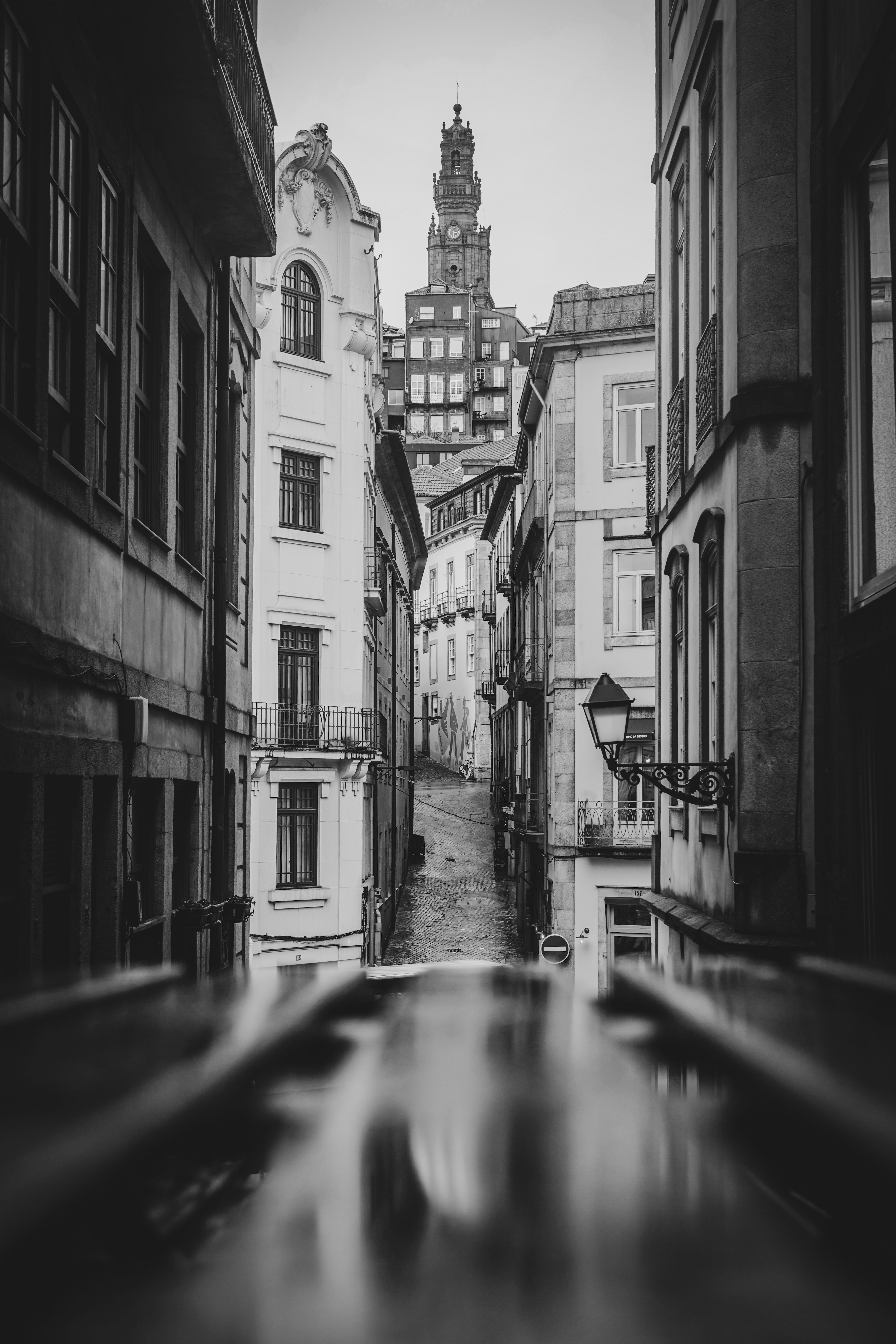 Historic European Street with Clock Tower View · Free Stock Photo