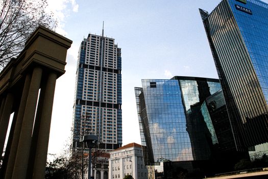 Contemporary skyscrapers tower in Sandton, South Africa, reflecting a vibrant urban skyline.