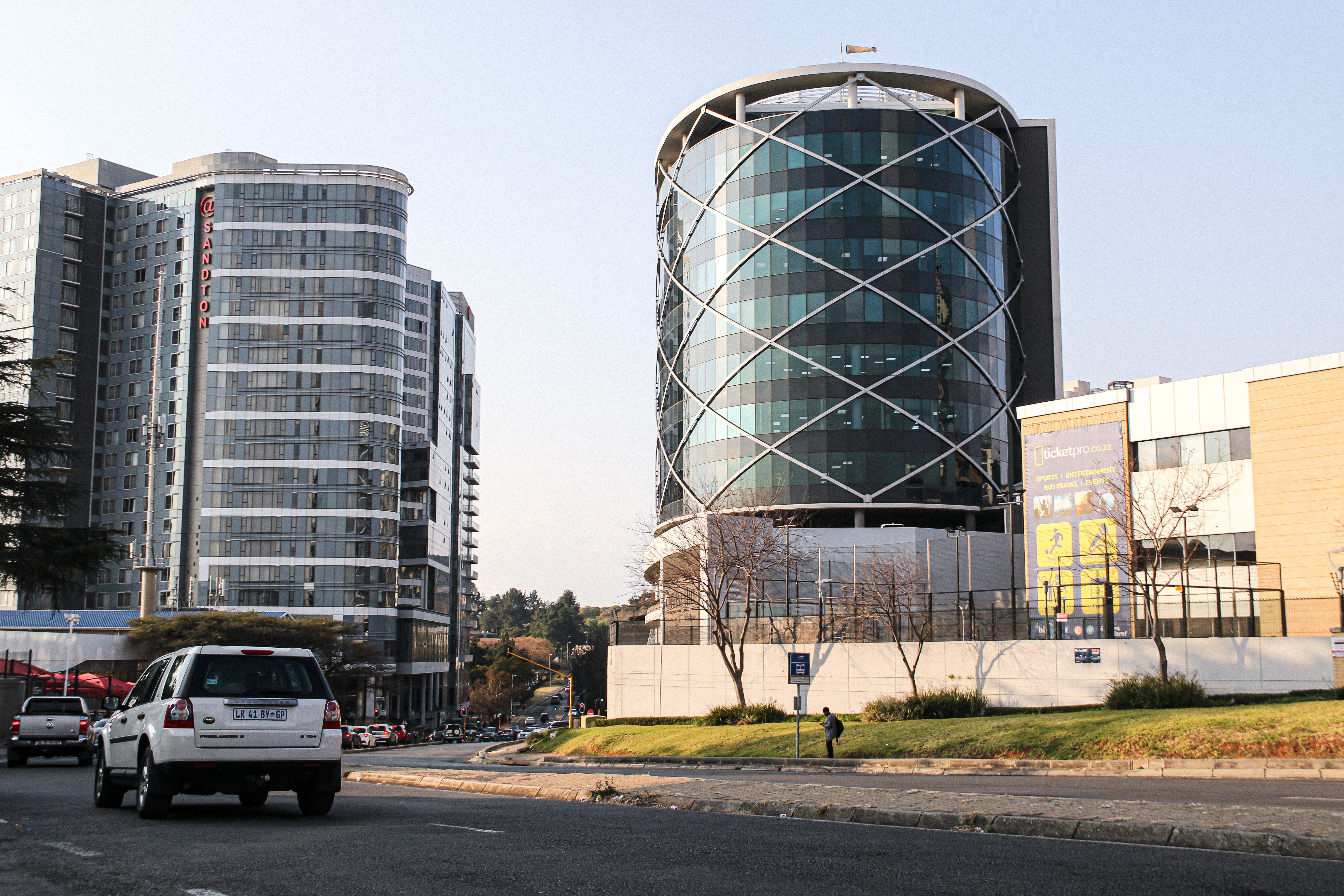High-rise buildings in Sandton, Johannesburg on a sunny day.