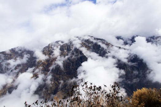 Scenic view of mist-covered mountains in Cabanaconde, Arequipa, Peru.