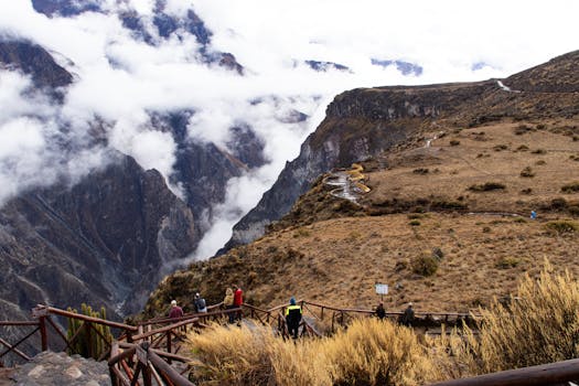 Breathtaking landscape of Colca Canyon with hikers exploring Cabanaconde, Arequipa, Peru.
