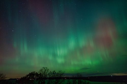 Free Captivating display of Northern Lights over Reads Landing, Minnesota, with vibrant colors lighting up the night sky. Stock Photo