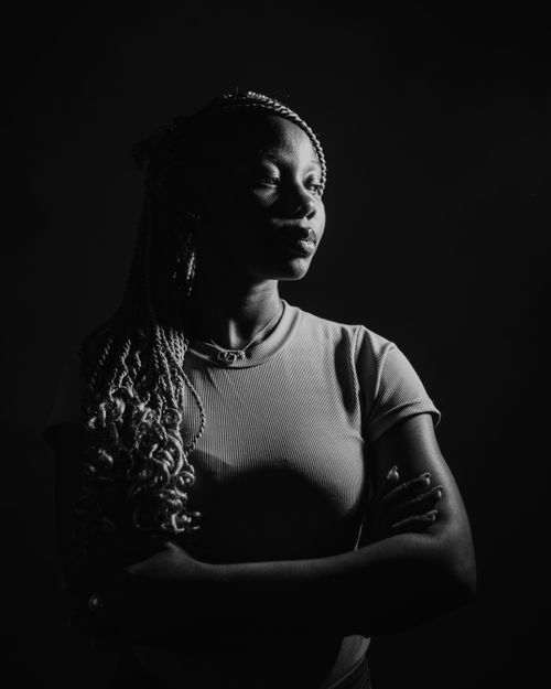 Free Striking black and white portrait with dramatic lighting and shadows. Stock Photo
