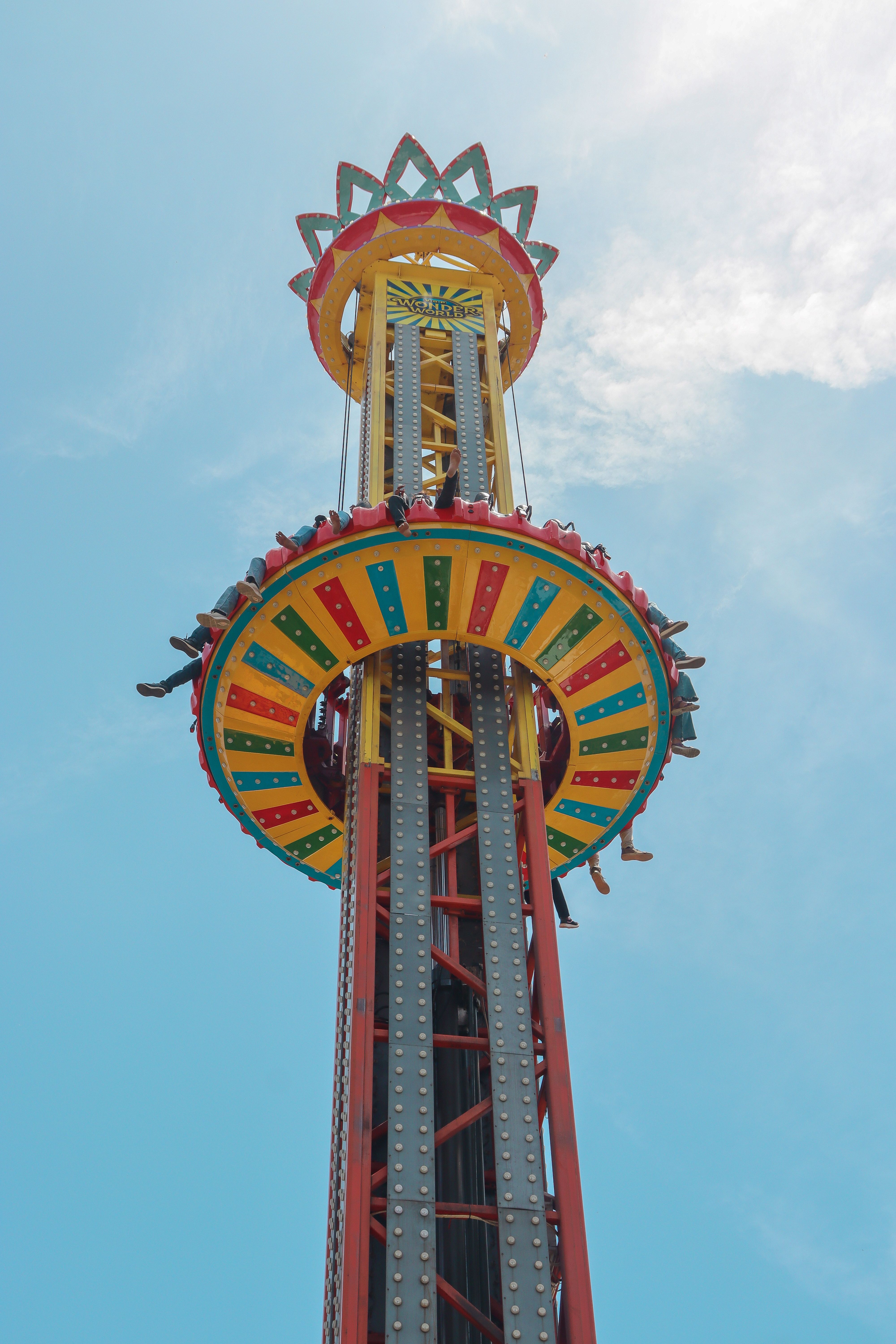 Thrilling Drop Tower Ride Against Clear Sky · Free Stock Photo