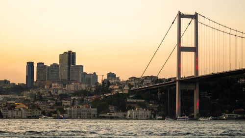 Free Stunning view of the Bosphorus Bridge and Istanbul's cityscape during sunset. Stock Photo
