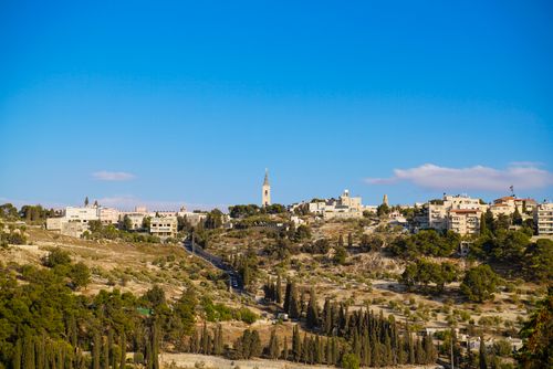 Free A picturesque view of Jerusalem countryside under a bright blue sky. Stock Photo