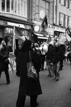 Monochrome scene of a protest in Dublin, showcasing activism and expression.