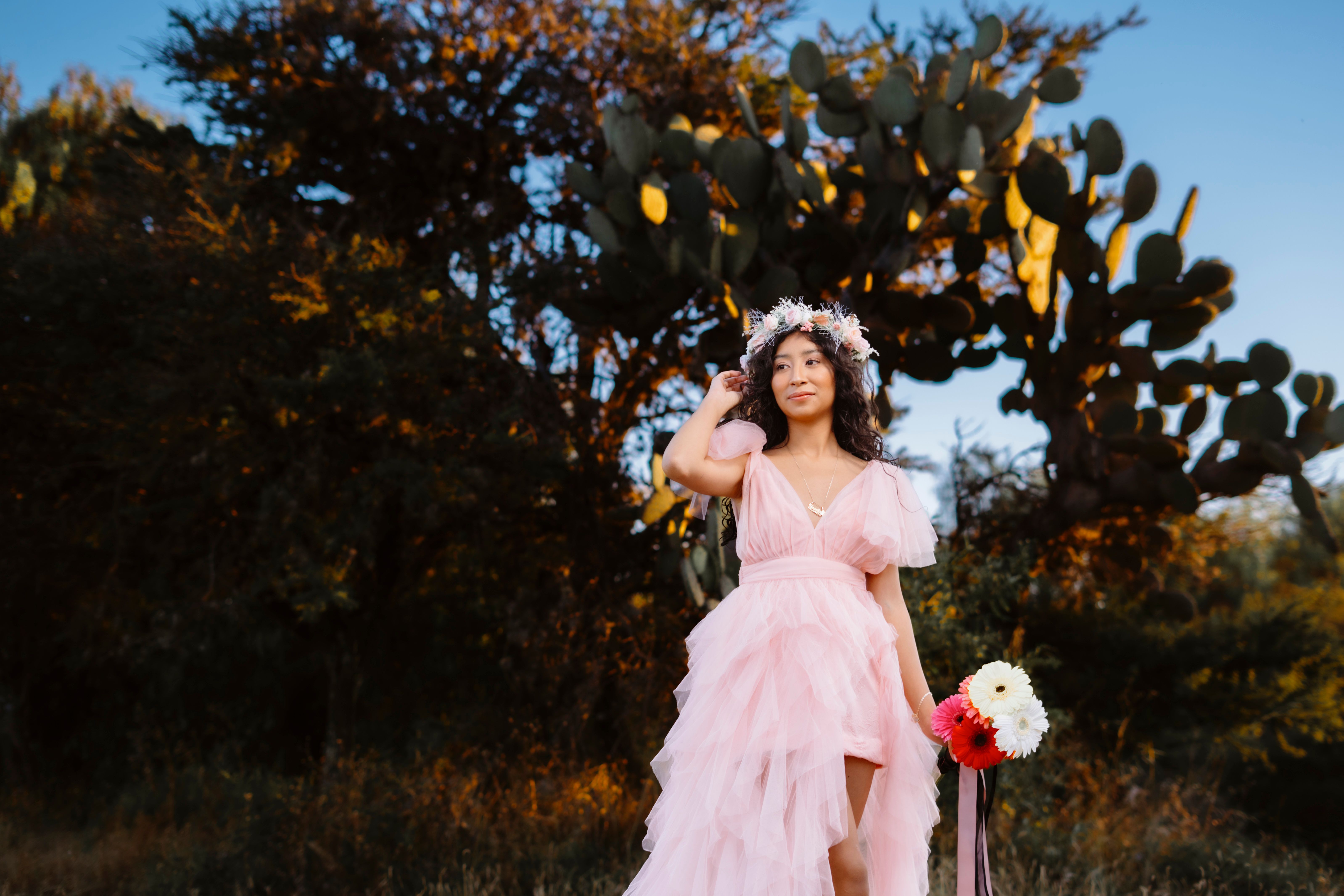 Woman in Pink Dress with Flowers Outdoors · Free Stock Photo