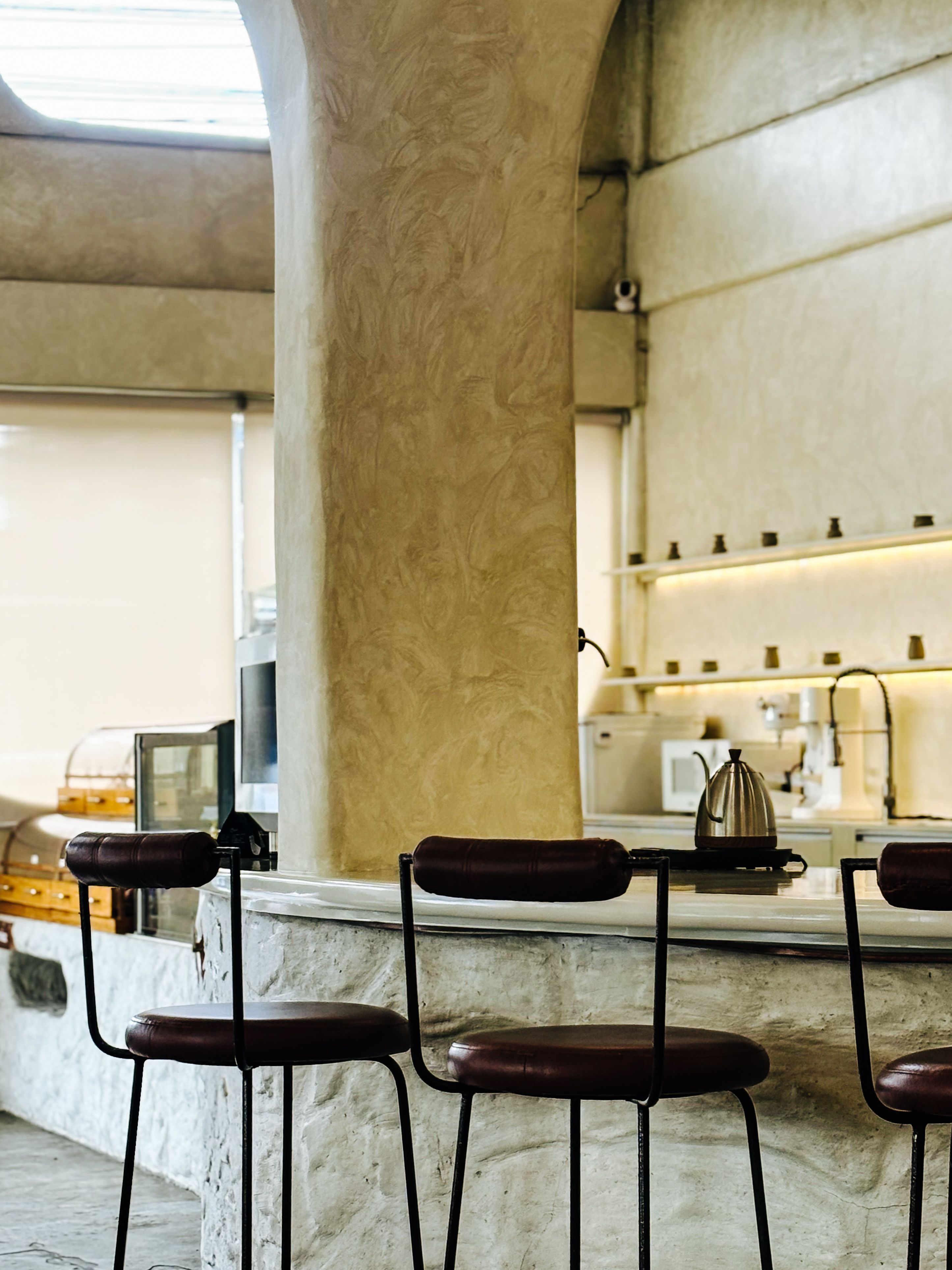 Cozy Modern Café Interior with Minimalist Design · Free Stock Photo