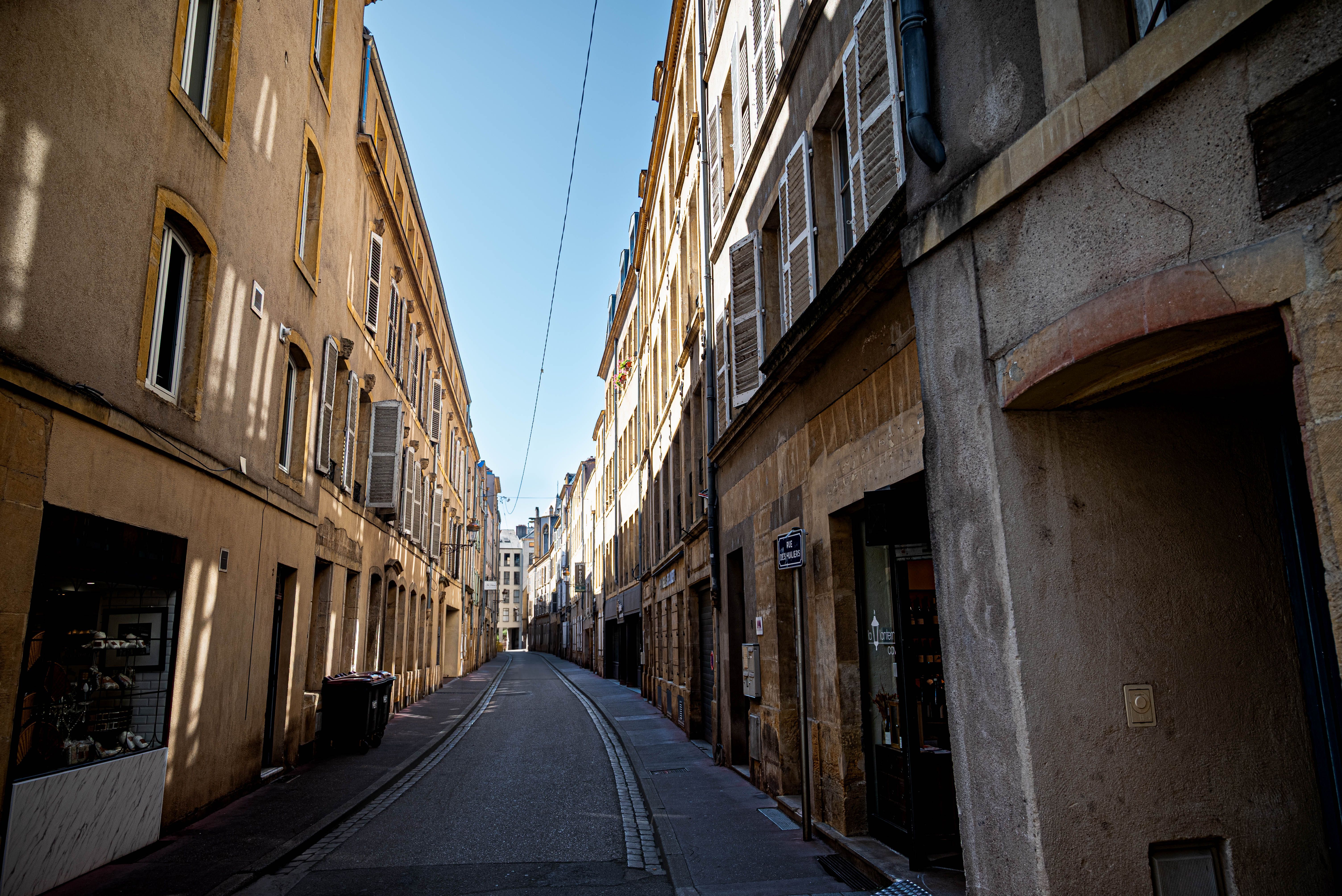 Charming narrow street in historic European town · Free Stock Photo