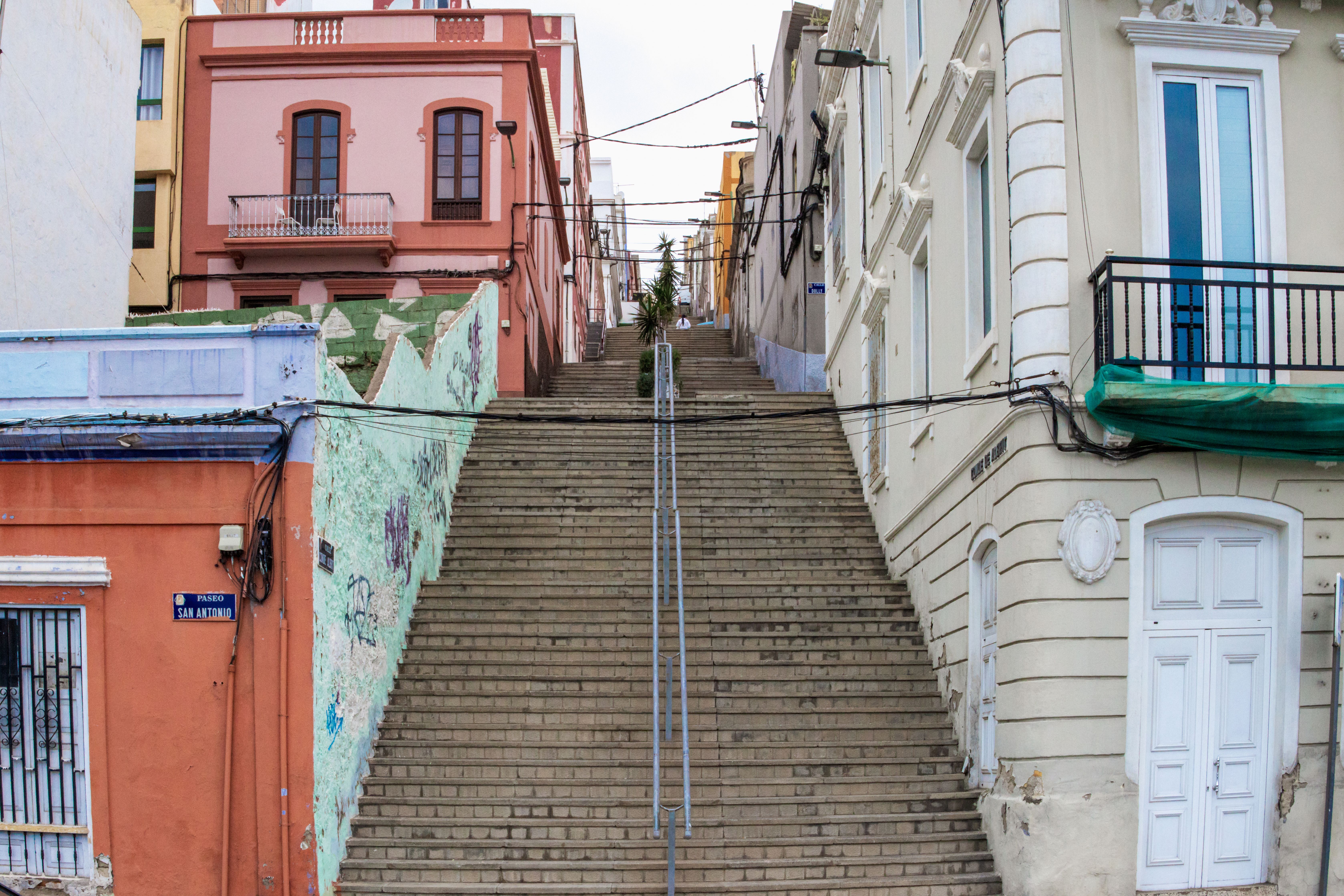 Scenic staircase with colorful buildings in Valparaíso, Chile.