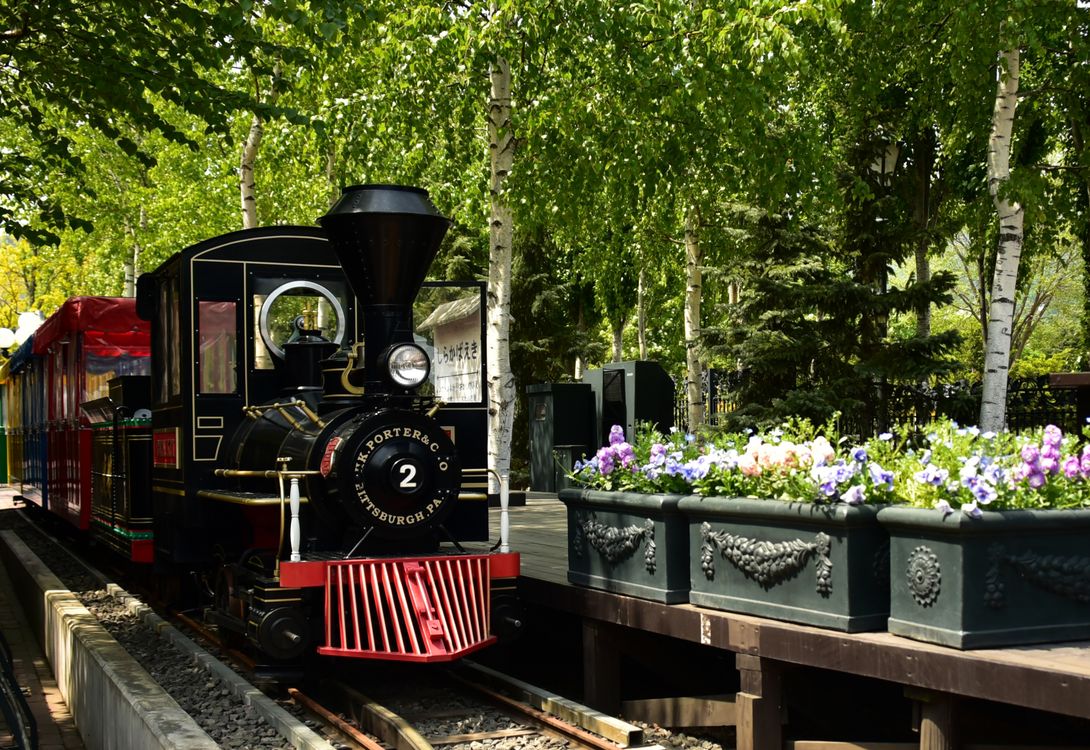 Spring Ridge Farm Train Vintage Train in Spring Garden Setting · Free Stock Photo