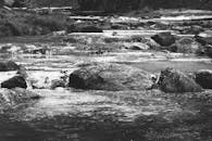 Serene Winter River Scene in Bormio, Italy