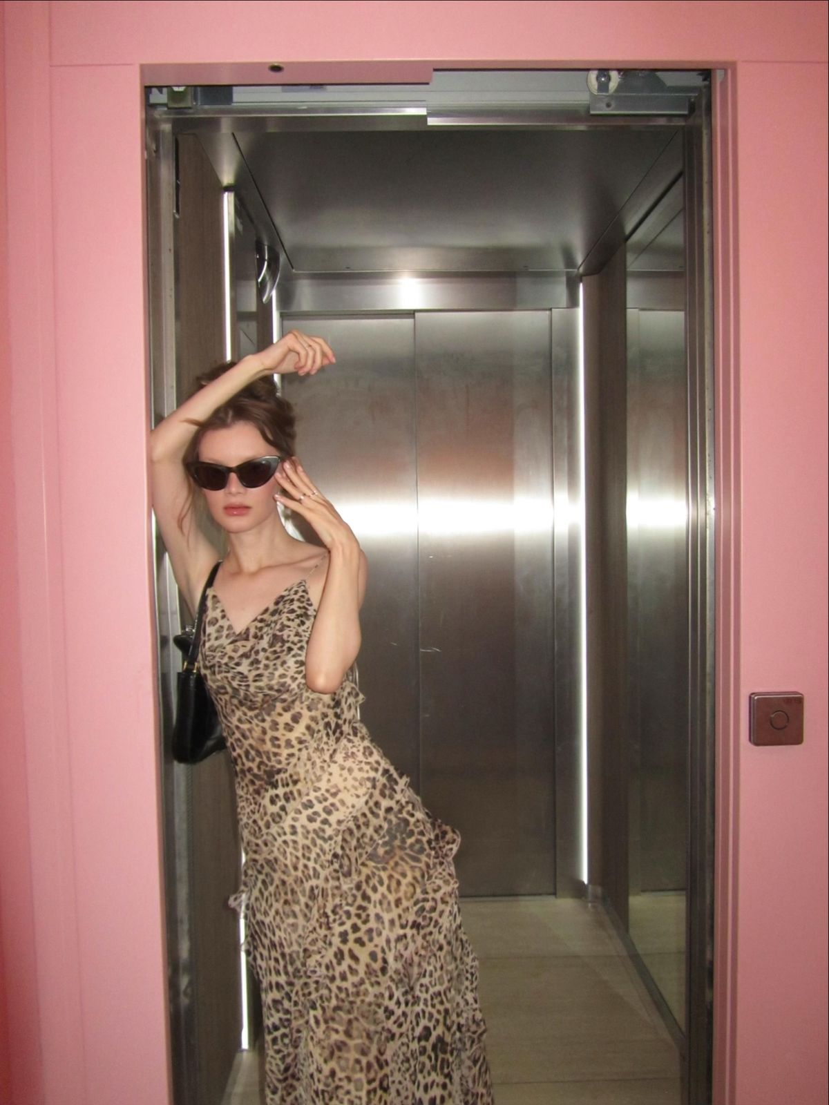 A stylish woman posing in animal print — leopard as evening drama