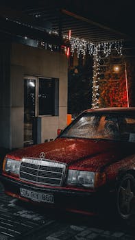 Vintage Mercedes-Benz car parked street at night, Istanbul setting.
