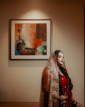 Beautiful bride in traditional attire with artistic background. Ideal for cultural themes.