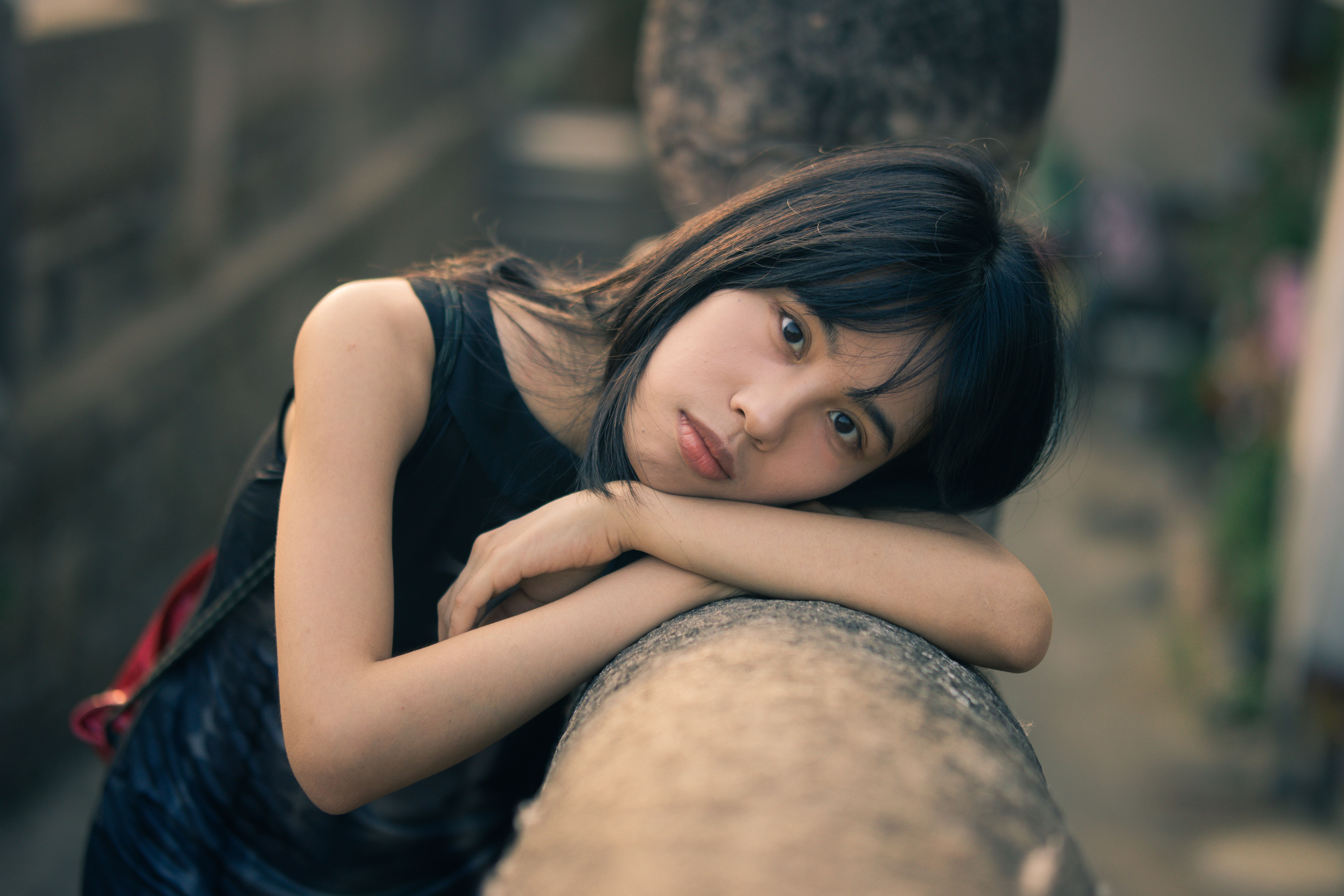 Contemplative Woman Resting Outdoors