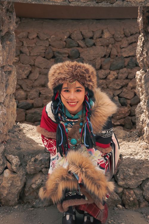 Rustic Woman Face Traditional Fur-Clad Woman in a Rustic Stone Setting · Free Stock Photo