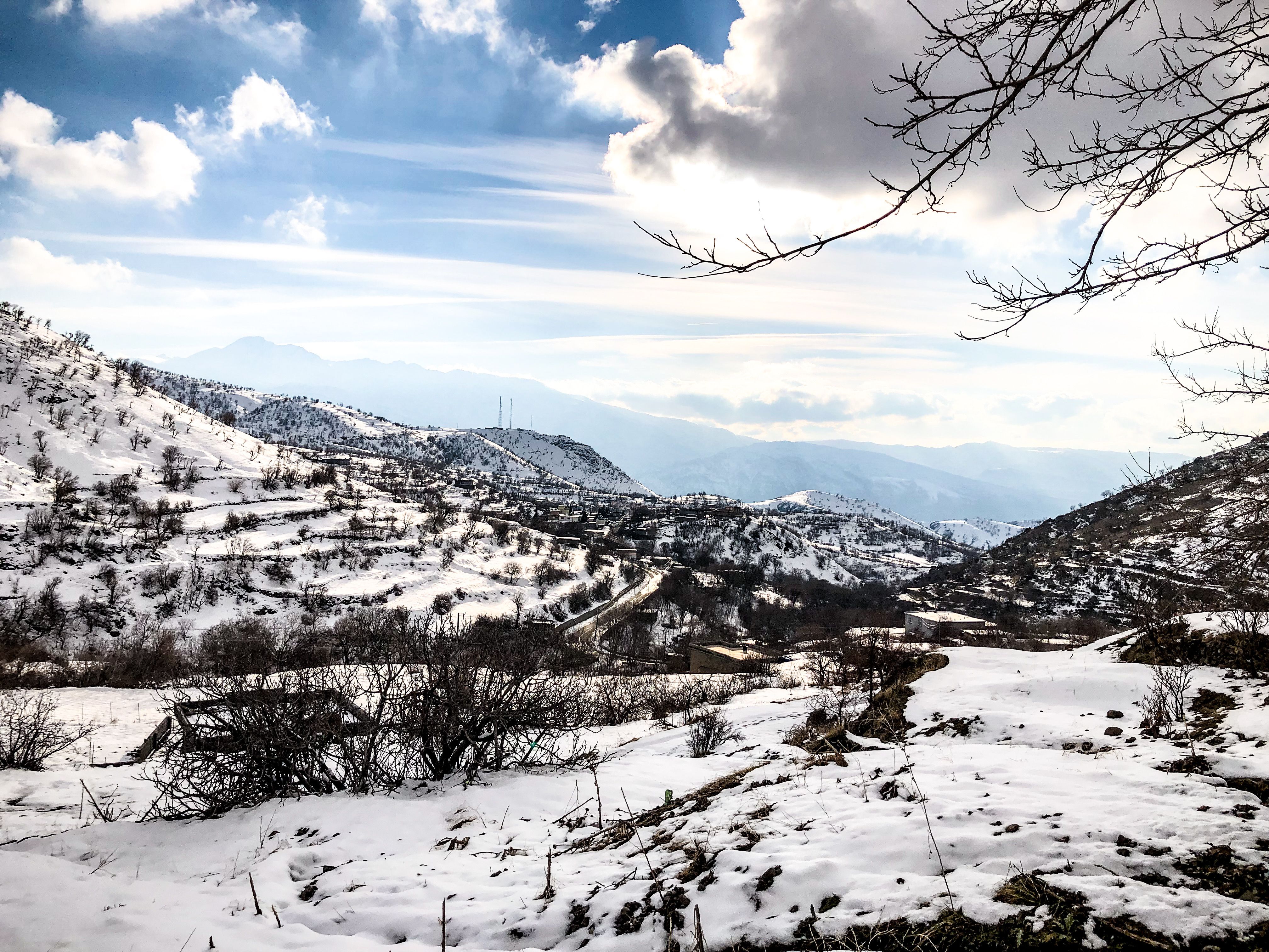 Scenic Snowy Mountain Landscape Under a Blue Sky · Free Stock Photo