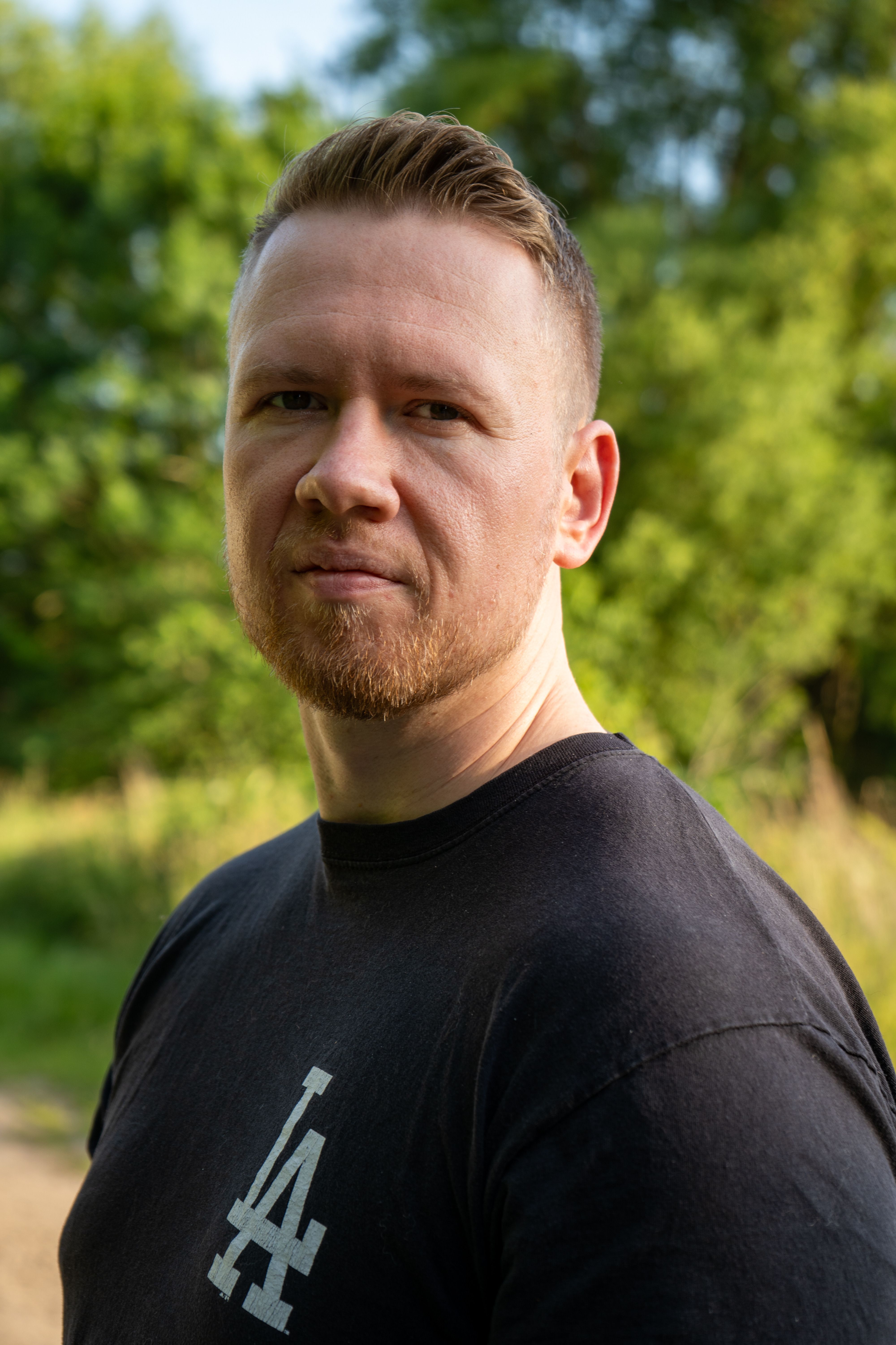 Outdoor Portrait of a Man in Casual Attire · Free Stock Photo