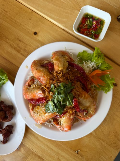Free Succulent shrimp with crispy fried toppings and herbs, served with spicy sauce. Stock Photo