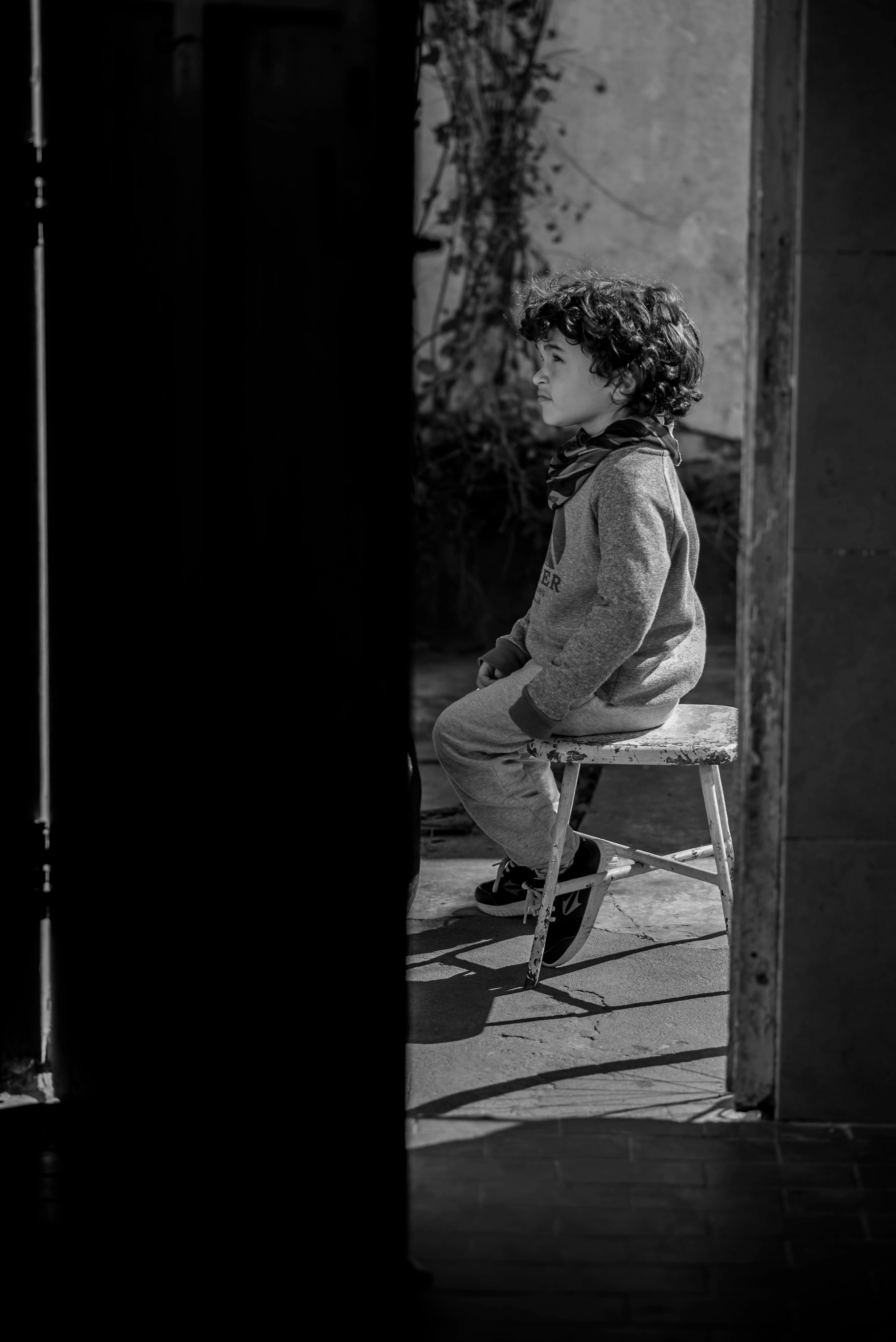 Thoughtful Child in Black and White Portrait · Free Stock Photo