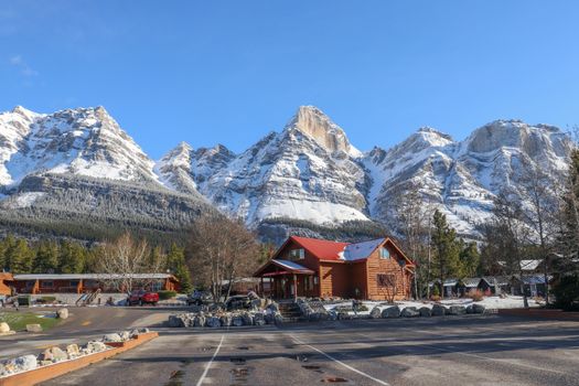 A picturesque lodge set against the stunning Rocky Mountains in Alberta.