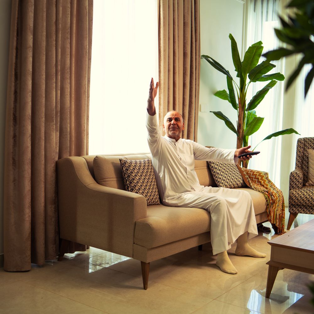 Caol — movers delivering furniture from a van