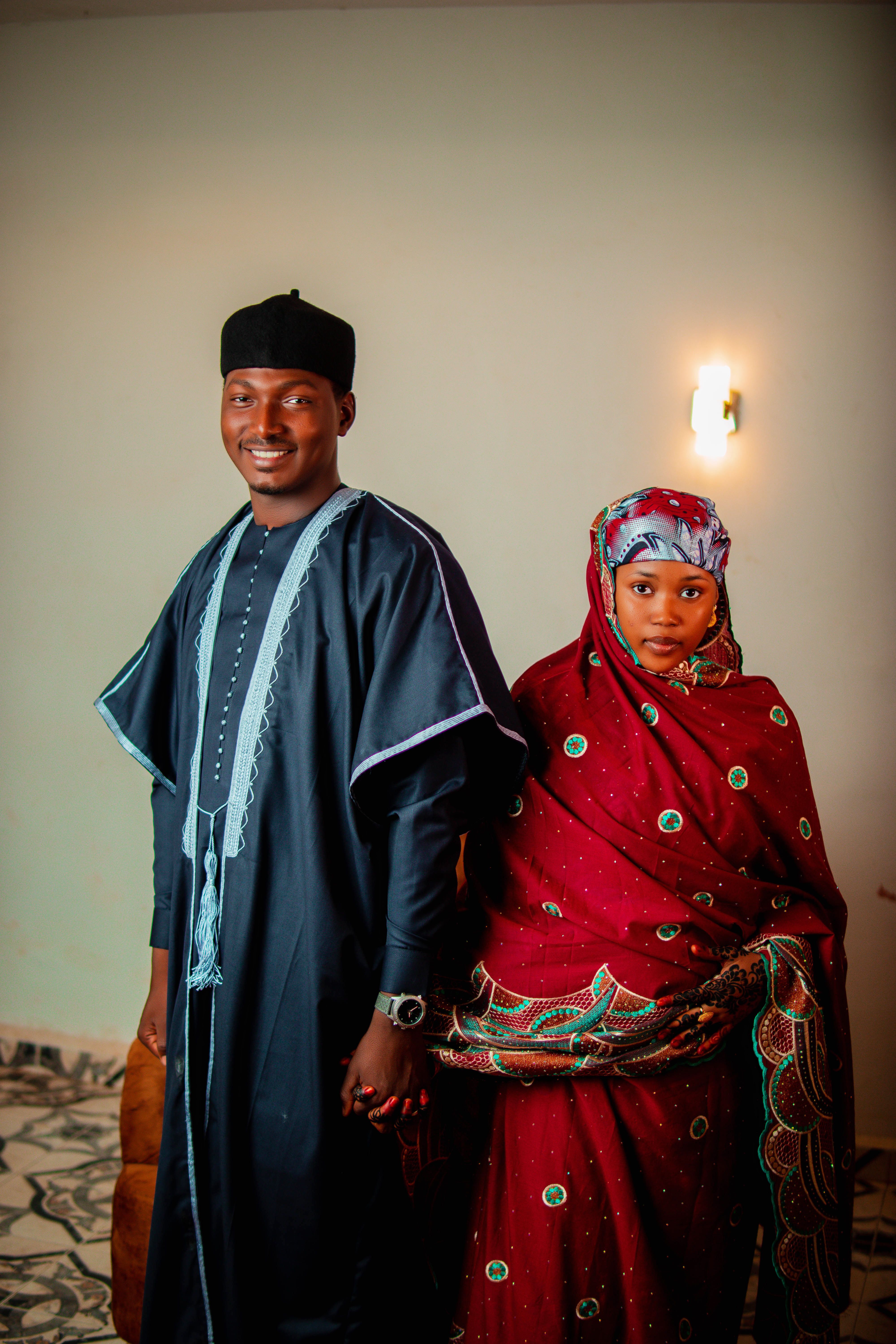 Traditional African Attire Couple Portrait Indoors · Free Stock Photo